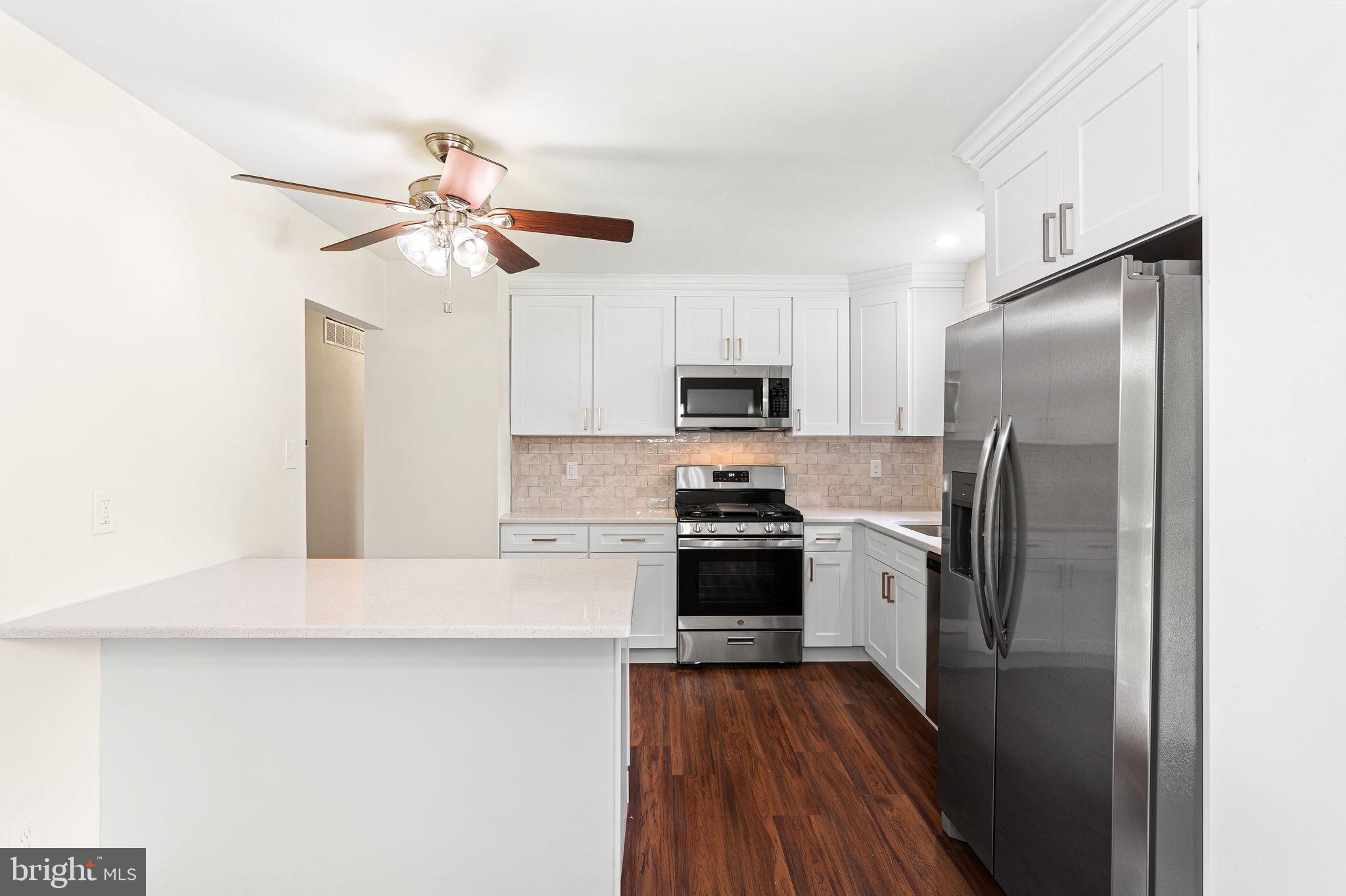 16 Prospect Avenue Sicklerville, NJ 08081 - Photo 3 of 34 Modern kitchen with sleek finishes.
