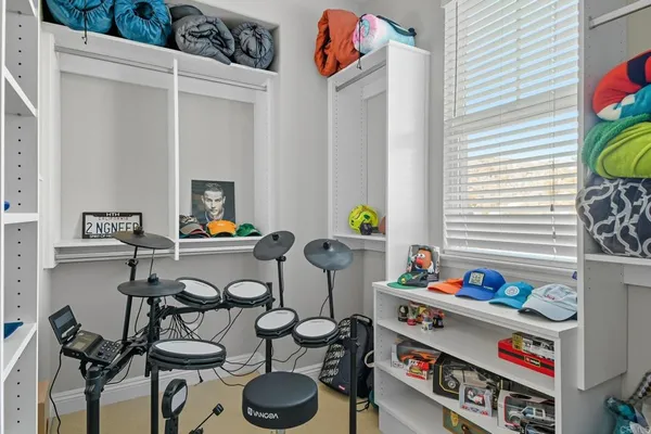 a view of a patio with a table chairs and a backyard