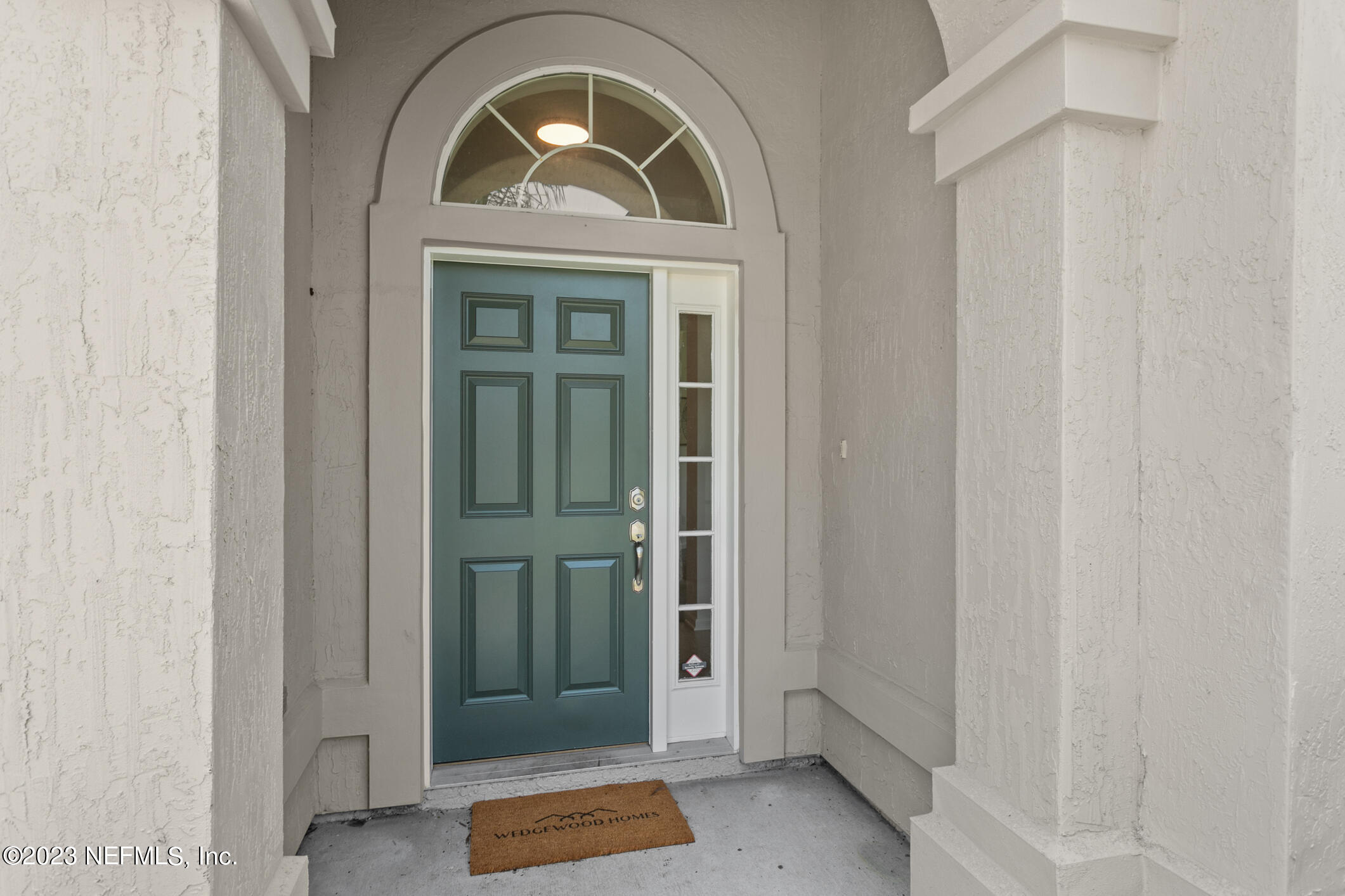 9188 Raptor Drive Jacksonville, FL 32221 - Photo 3 of 36 a view of livingroom with entryway