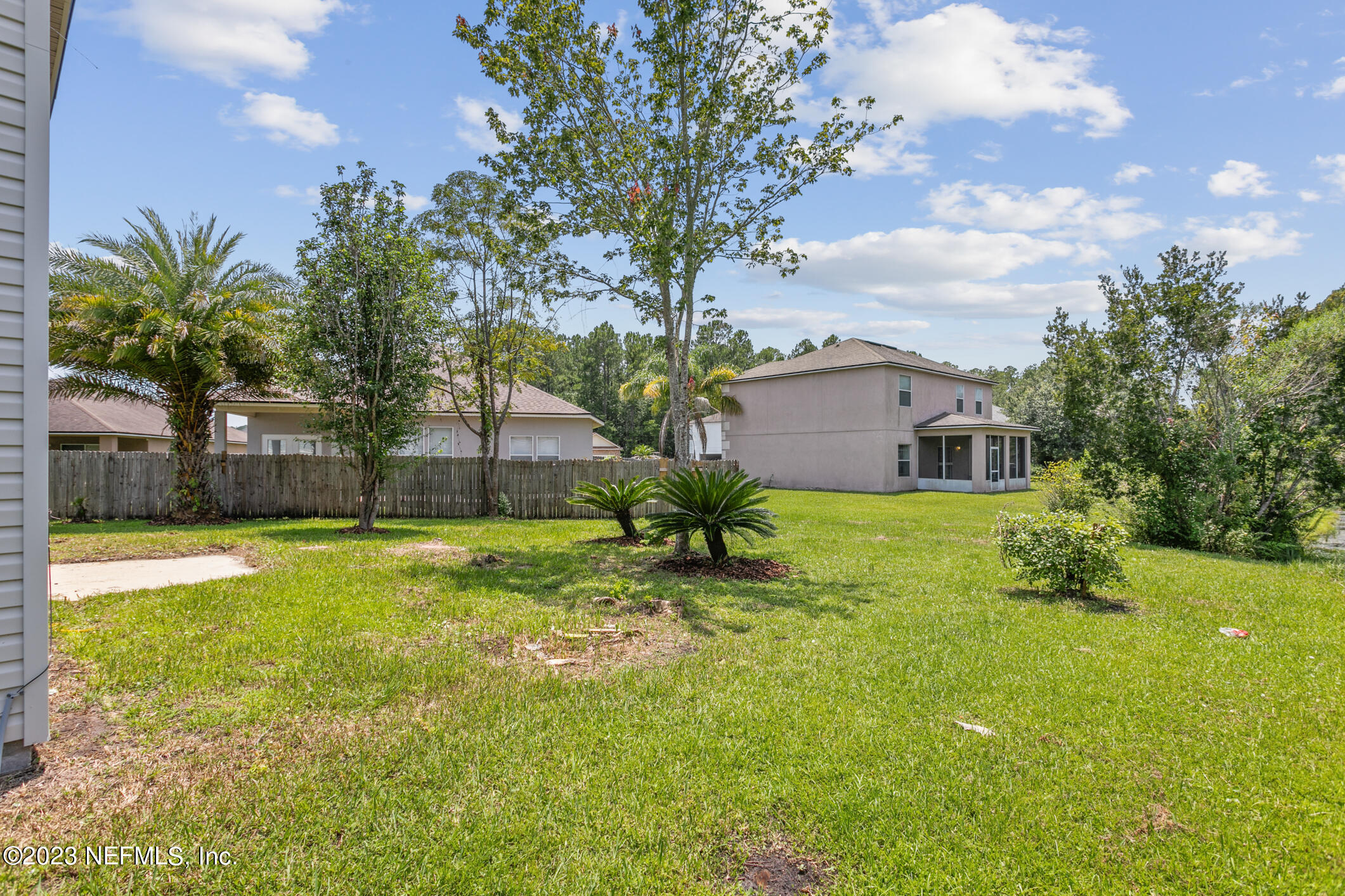 9188 Raptor Drive Jacksonville, FL 32221 - Photo 34 of 36 a house view with a garden space
