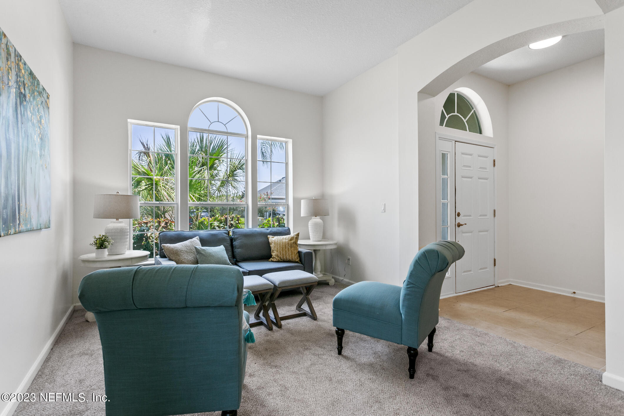 9188 Raptor Drive Jacksonville, FL 32221 - Photo 6 of 36 a living room with furniture and a window
