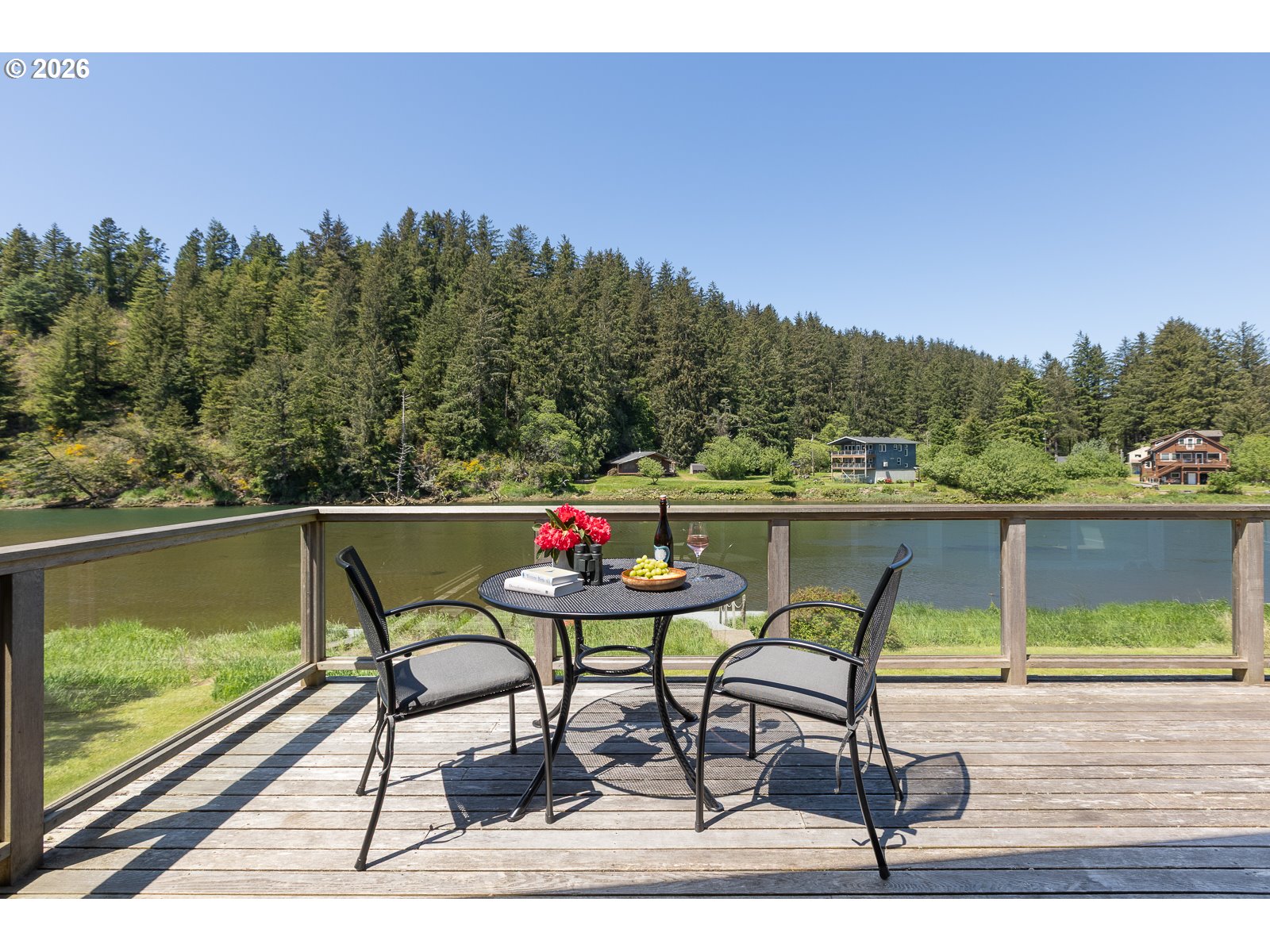 34098 Brooten Road Pacific City, OR 97135 - Photo 28 of 38 a view of a chairs and table on the balcony