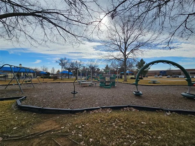 a view of yard with swimming pool