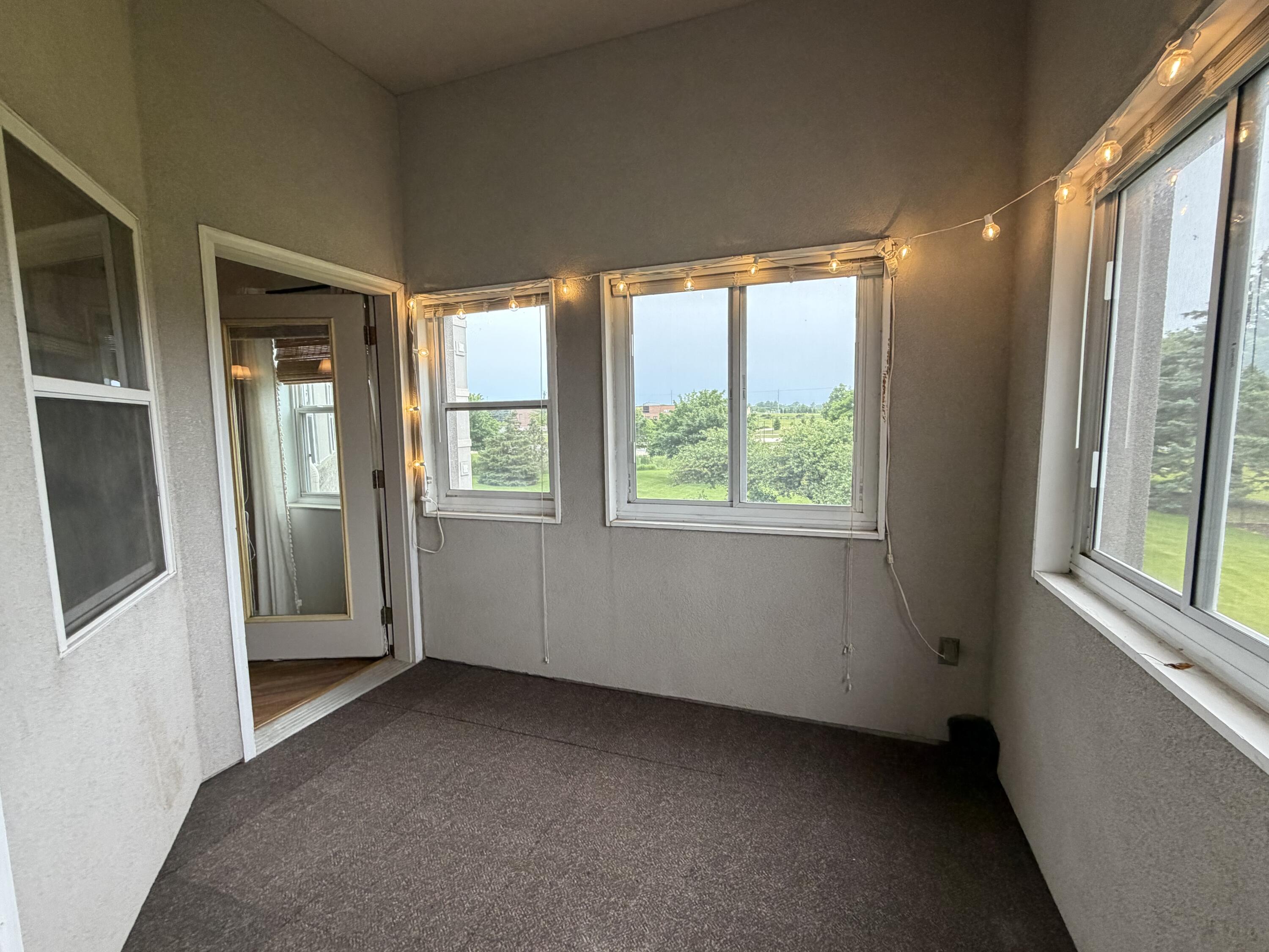 3903 Heather Valley Road, Unit 208 Sheboygan, WI 53083 - Photo 18 of 19 Sunroom
