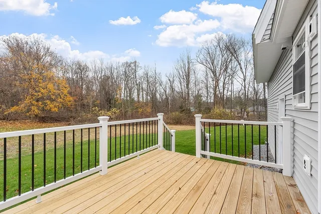 a view of a wooden roof deck