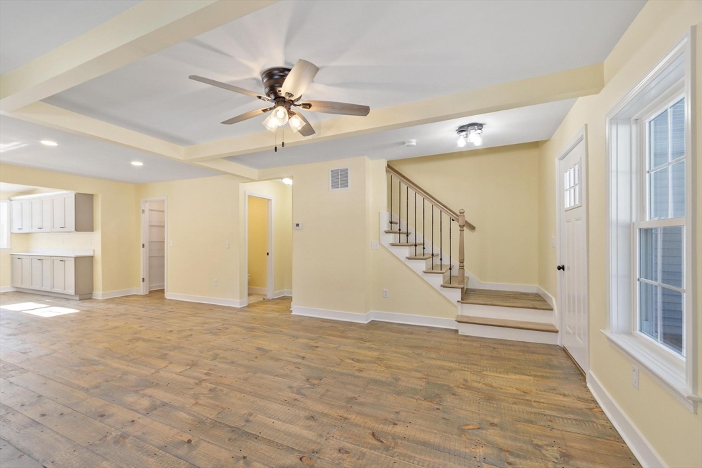 120 Townsend Street, Unit 1 Pepperell, MA 01463 - Photo 7 of 25 a view of an entryway with wooden floor