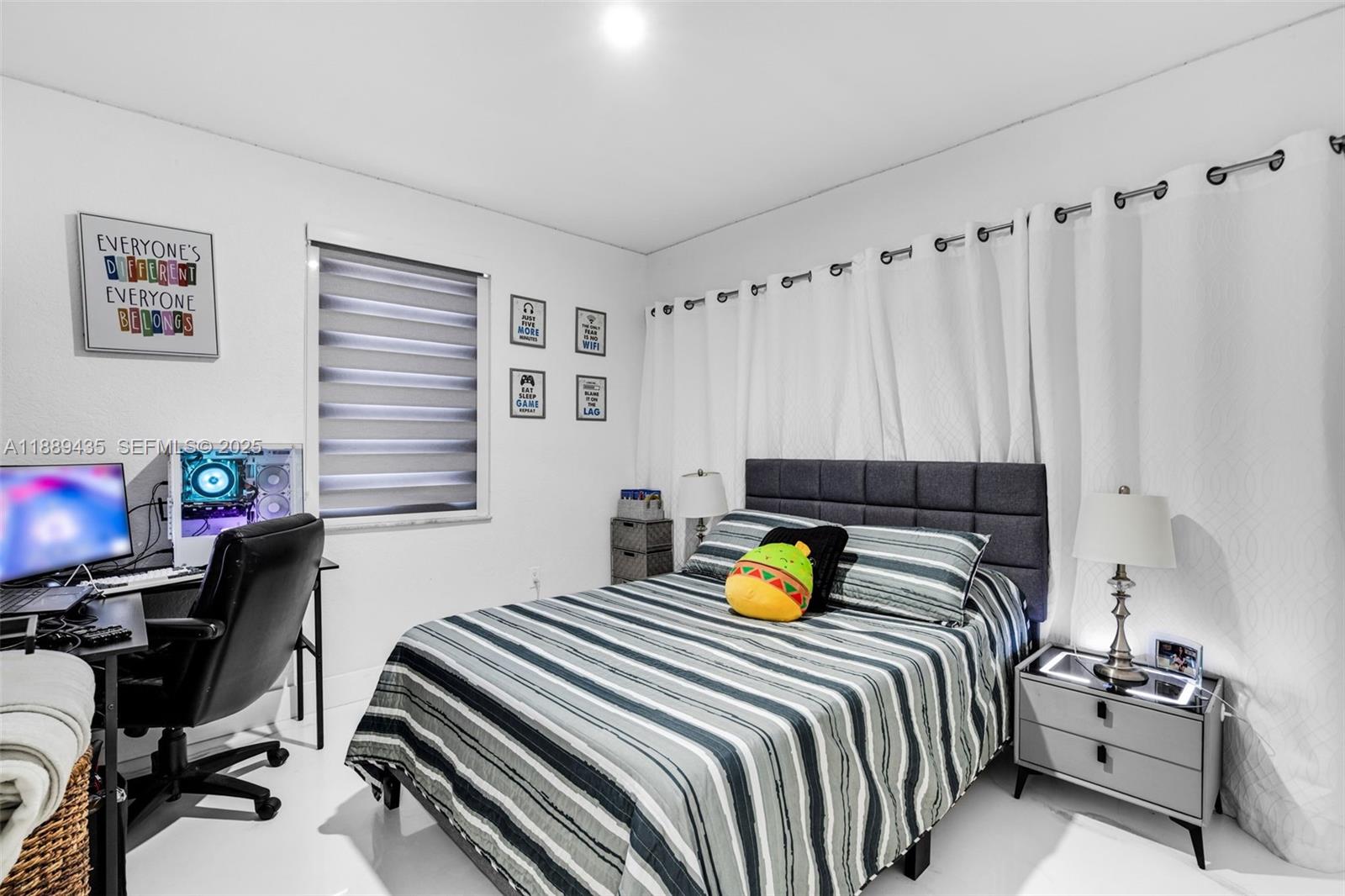 3022 Northwest 95th Street Miami, FL 33147 - Photo 21 of 47 a bedroom that has a bed and a chair in it