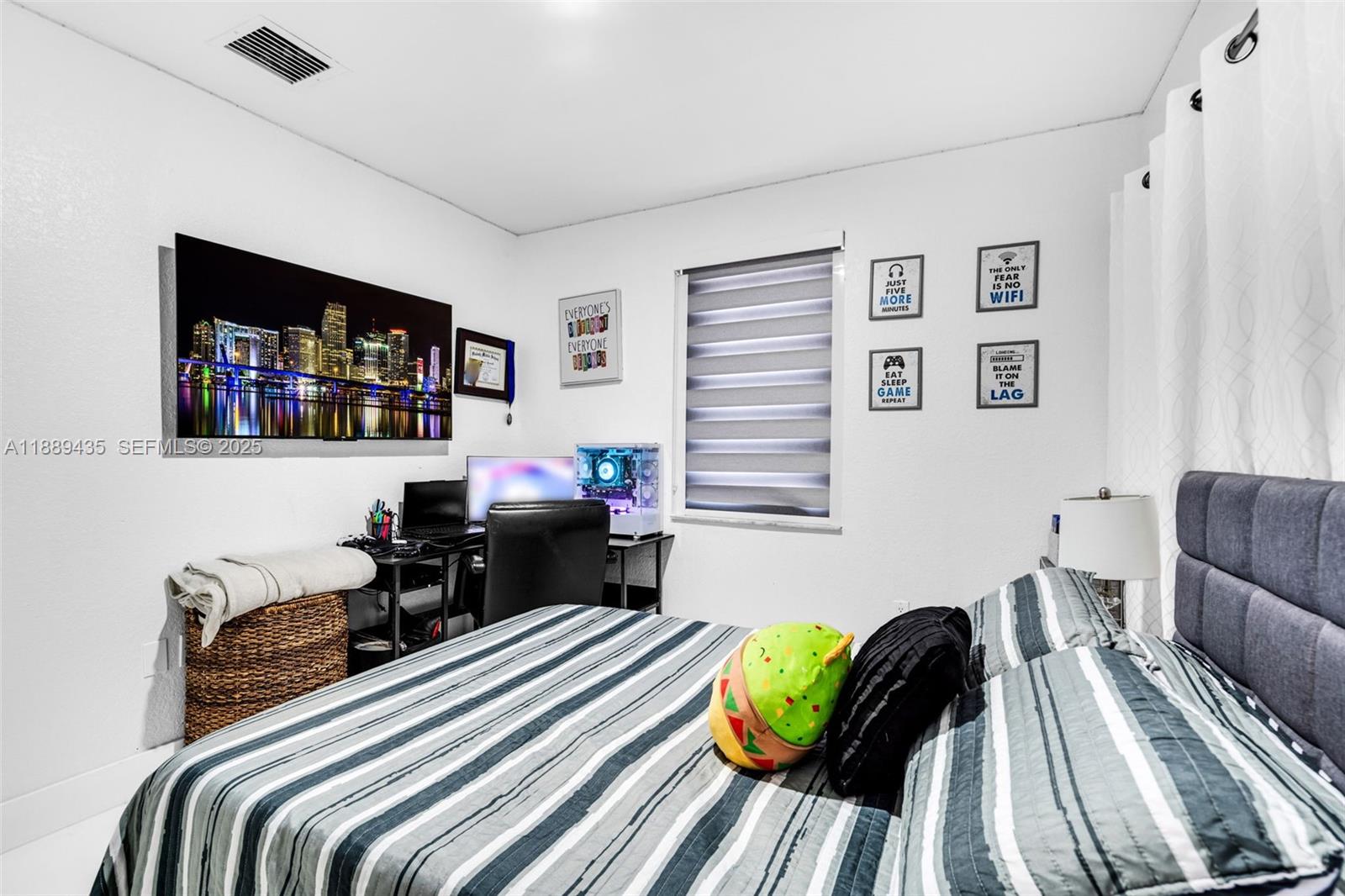 3022 Northwest 95th Street Miami, FL 33147 - Photo 22 of 47 a bedroom with a bed and a couch