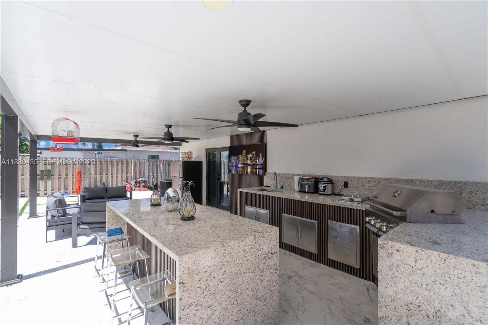 3022 Northwest 95th Street Miami, FL 33147 - Photo 34 of 47 a kitchen with a stove and a cabinets