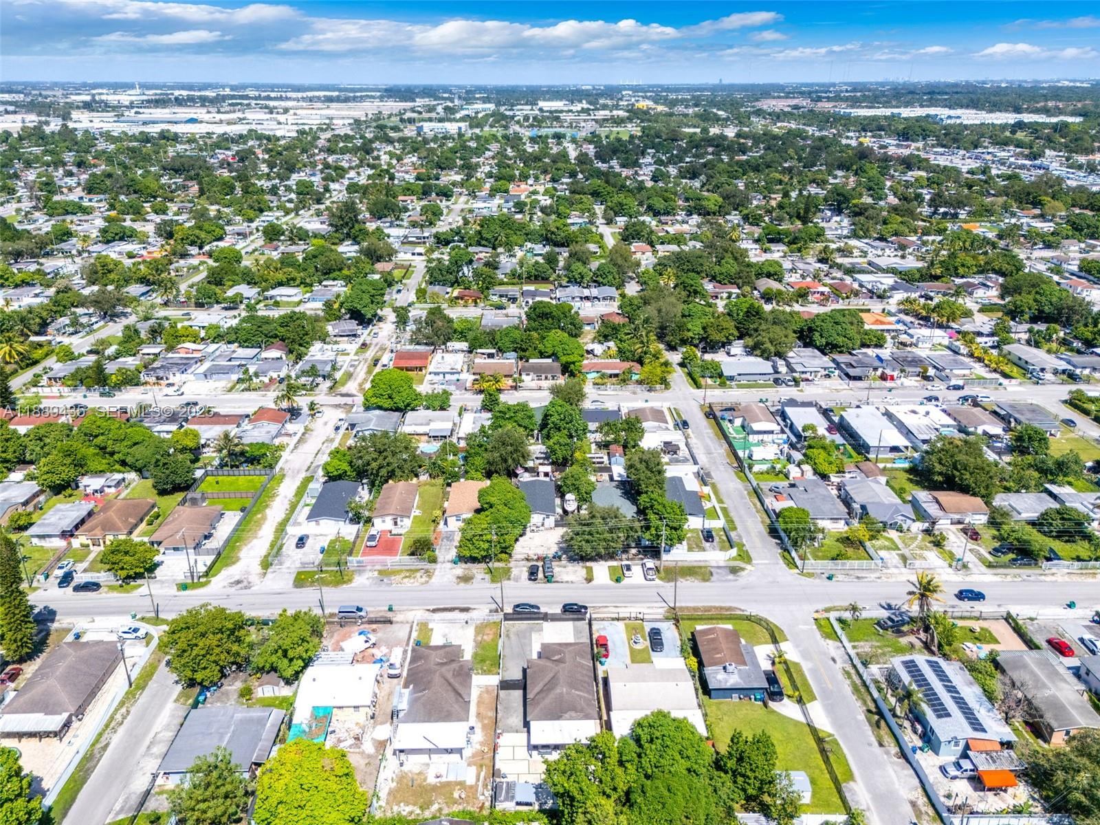 3022 Northwest 95th Street Miami, FL 33147 - Photo 42 of 47 an aerial view of residential houses with outdoor space
