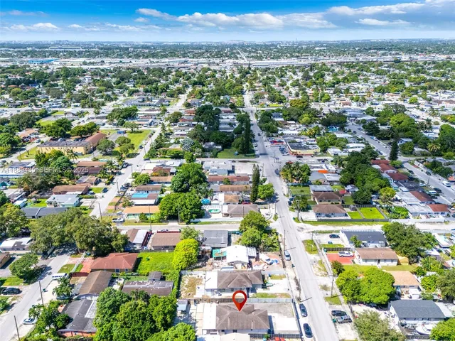 an aerial view of a city with lots of residential buildings