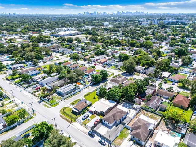 an aerial view of a city with lots of residential buildings