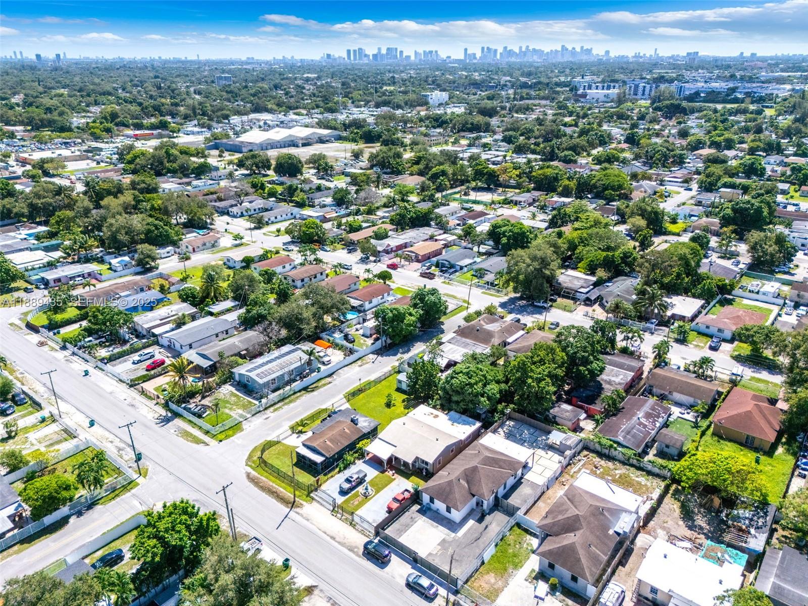 3022 Northwest 95th Street Miami, FL 33147 - Photo 45 of 47 an aerial view of a city with lots of residential buildings