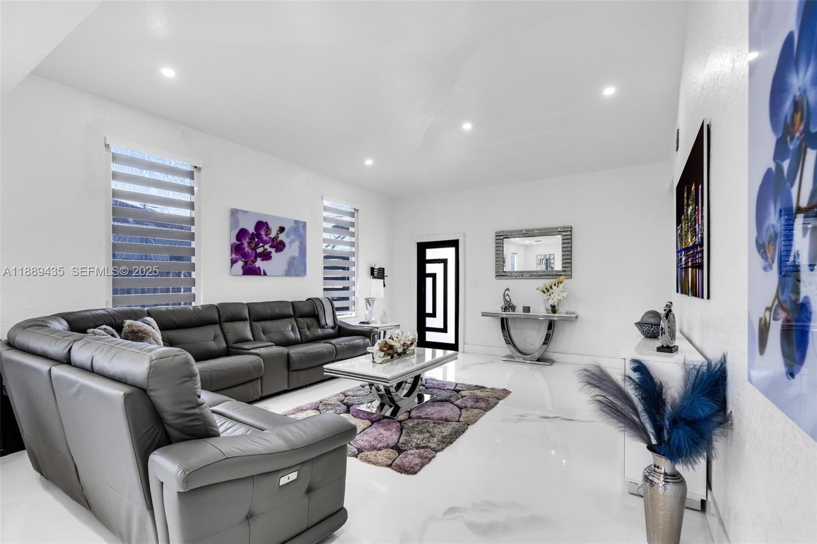 3022 Northwest 95th Street Miami, FL 33147 - Photo 6 of 47 a living room with furniture and a flat screen tv