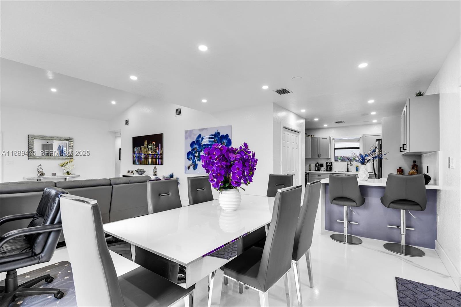 3022 Northwest 95th Street Miami, FL 33147 - Photo 10 of 47 a large kitchen with a table and chairs