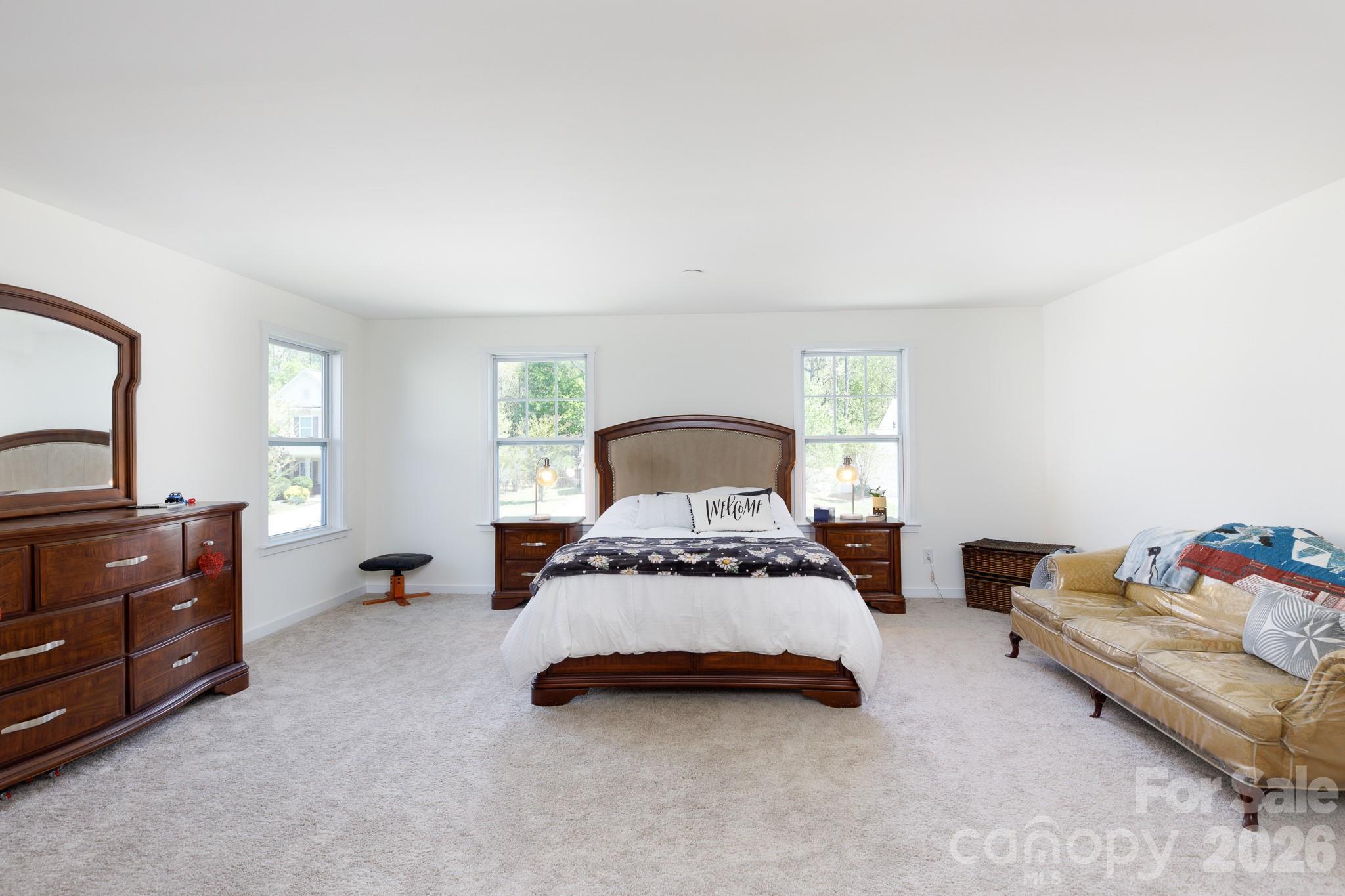 3121 Crosswind Drive Fort Mill, SC 29707 - Photo 17 of 31 a bedroom with a bed and window