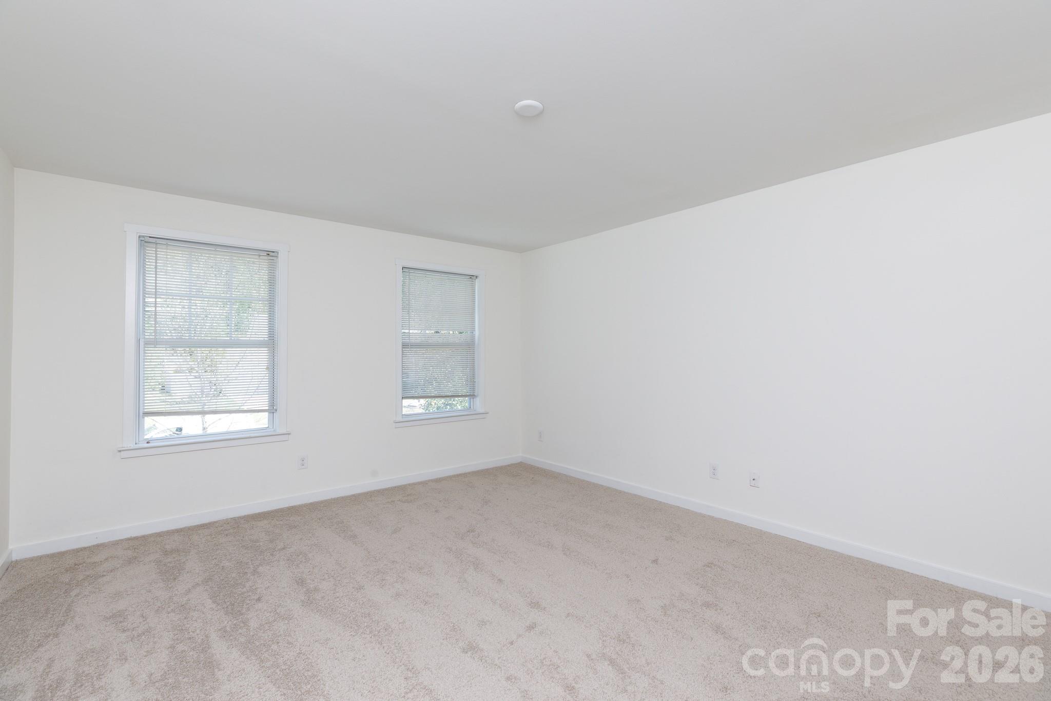 3121 Crosswind Drive Fort Mill, SC 29707 - Photo 21 of 31 an empty room with windows