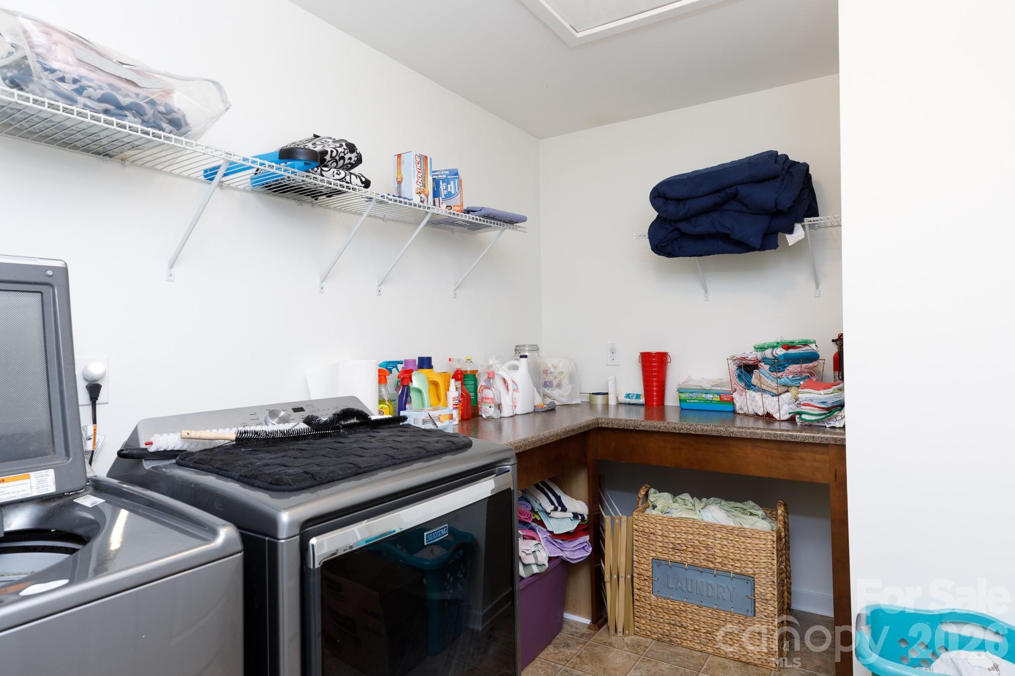 3121 Crosswind Drive Fort Mill, SC 29707 - Photo 26 of 31 a utility room with dryer and washer