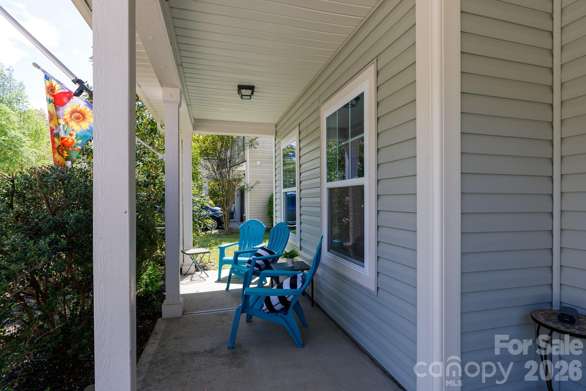 3121 Crosswind Drive Fort Mill, SC 29707 - Photo 3 of 31 a view of a door with a chairs and table in a patio