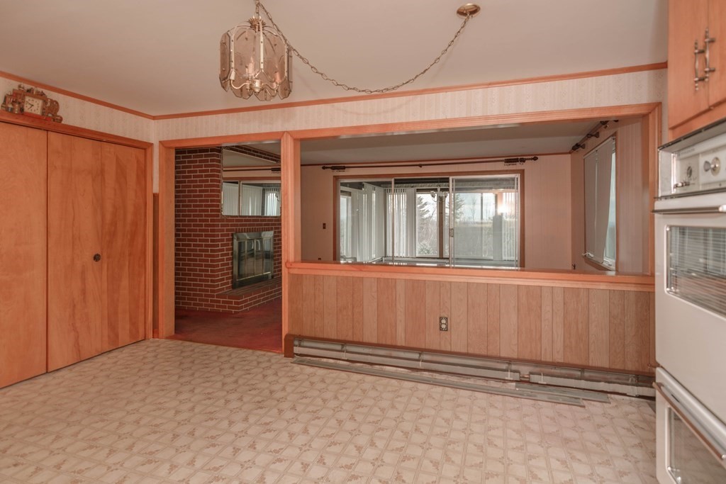 44 Telephone Road Ashby, MA 01431 - Photo 13 of 28 a view of a room with wooden floor and windows