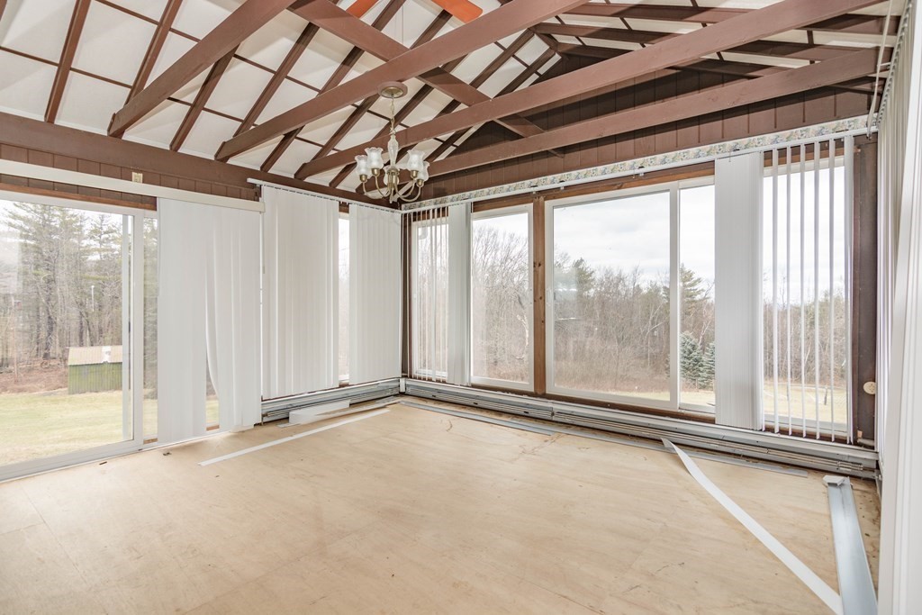 44 Telephone Road Ashby, MA 01431 - Photo 17 of 28 a view of an empty room with a balcony