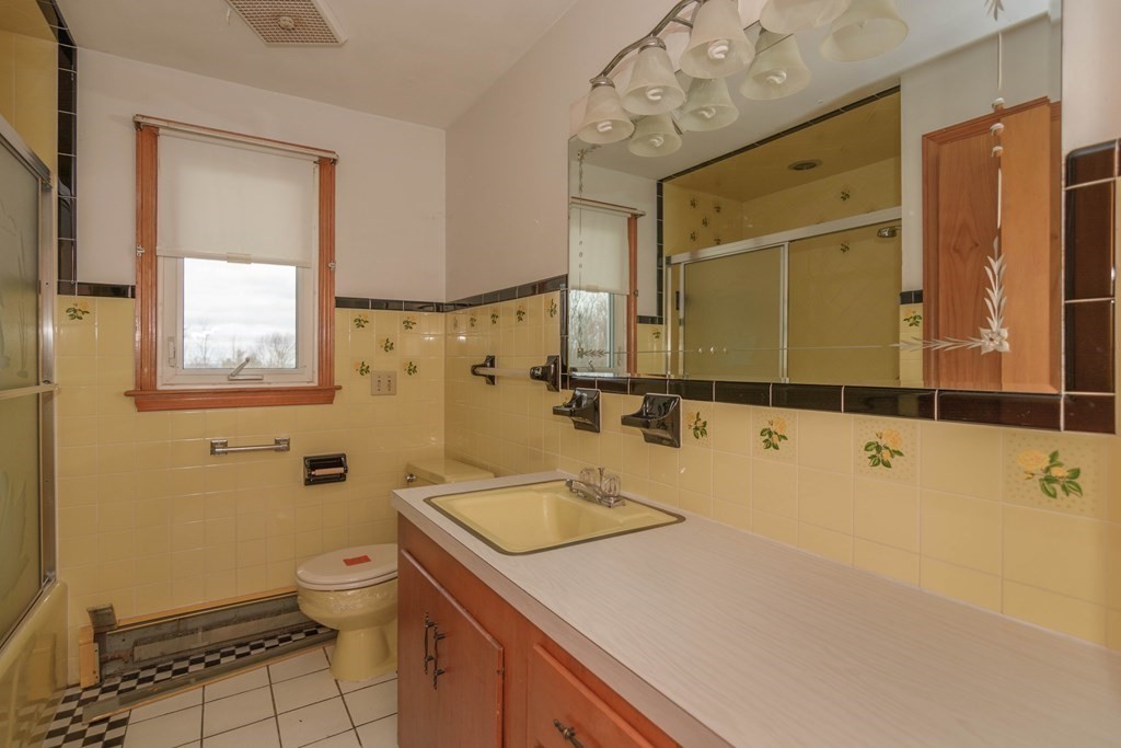 44 Telephone Road Ashby, MA 01431 - Photo 21 of 28 a bathroom with a sink a toilet and shower