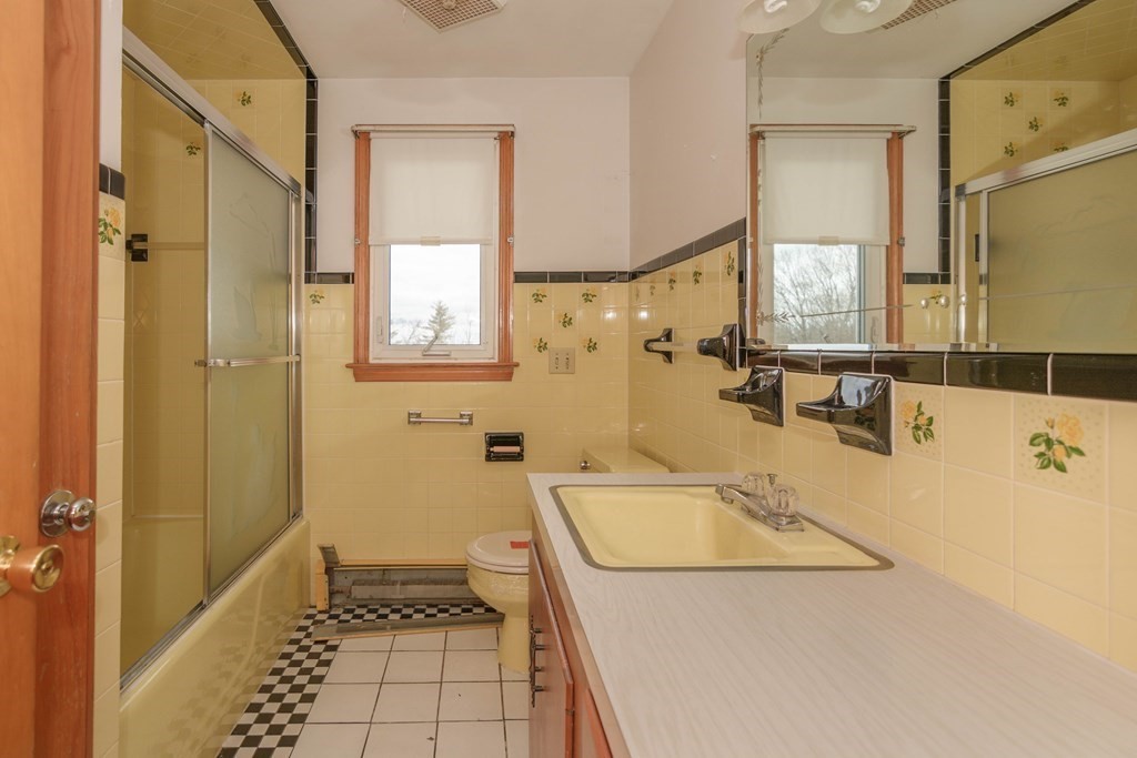44 Telephone Road Ashby, MA 01431 - Photo 22 of 28 a bathroom with a tub sink and mirror