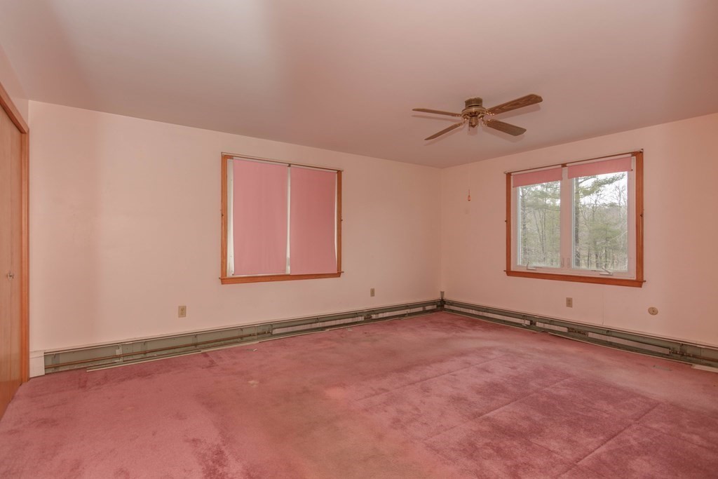 44 Telephone Road Ashby, MA 01431 - Photo 25 of 28 an empty room with windows