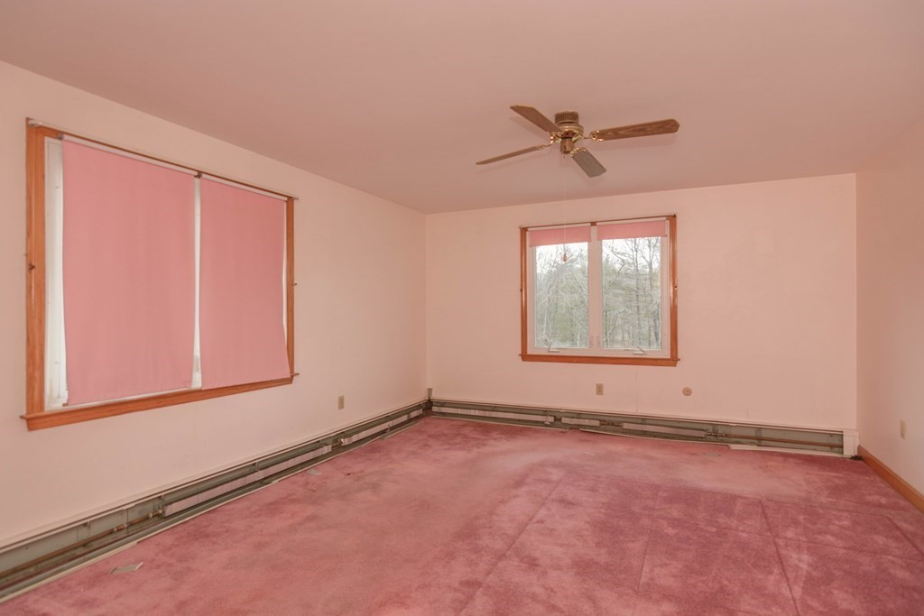 44 Telephone Road Ashby, MA 01431 - Photo 26 of 28 an empty room with windows and fan