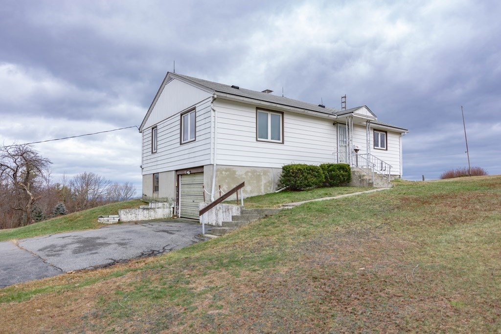 44 Telephone Road Ashby, MA 01431 - Photo 3 of 28 a view of a house with a yard