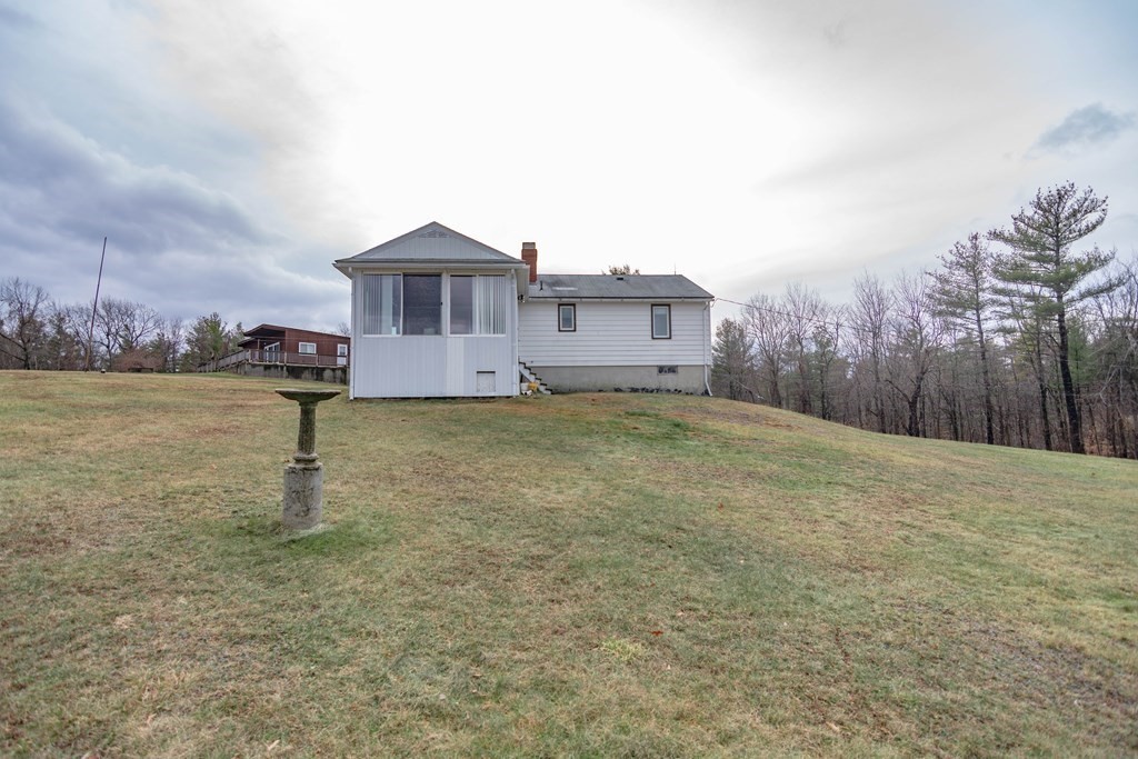 44 Telephone Road Ashby, MA 01431 - Photo 7 of 28 a house view with a garden space