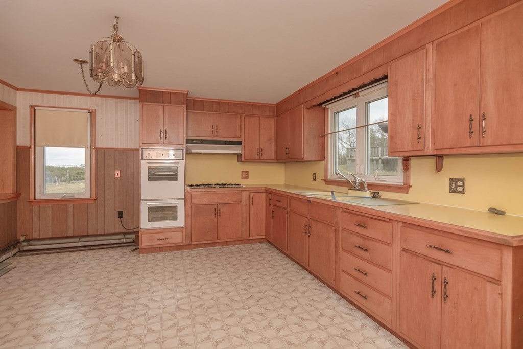 44 Telephone Road Ashby, MA 01431 - Photo 10 of 28 a kitchen with sink cabinets and window