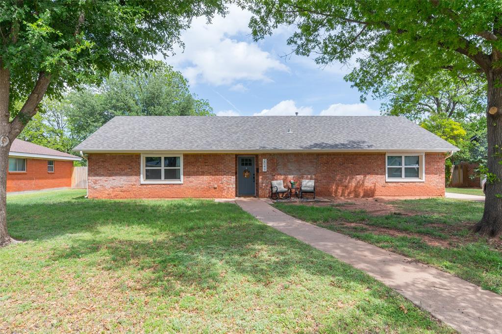 2049 Post Oak Road Abilene, TX 79605 - Photo 1 of 1 a front view of a house with garden