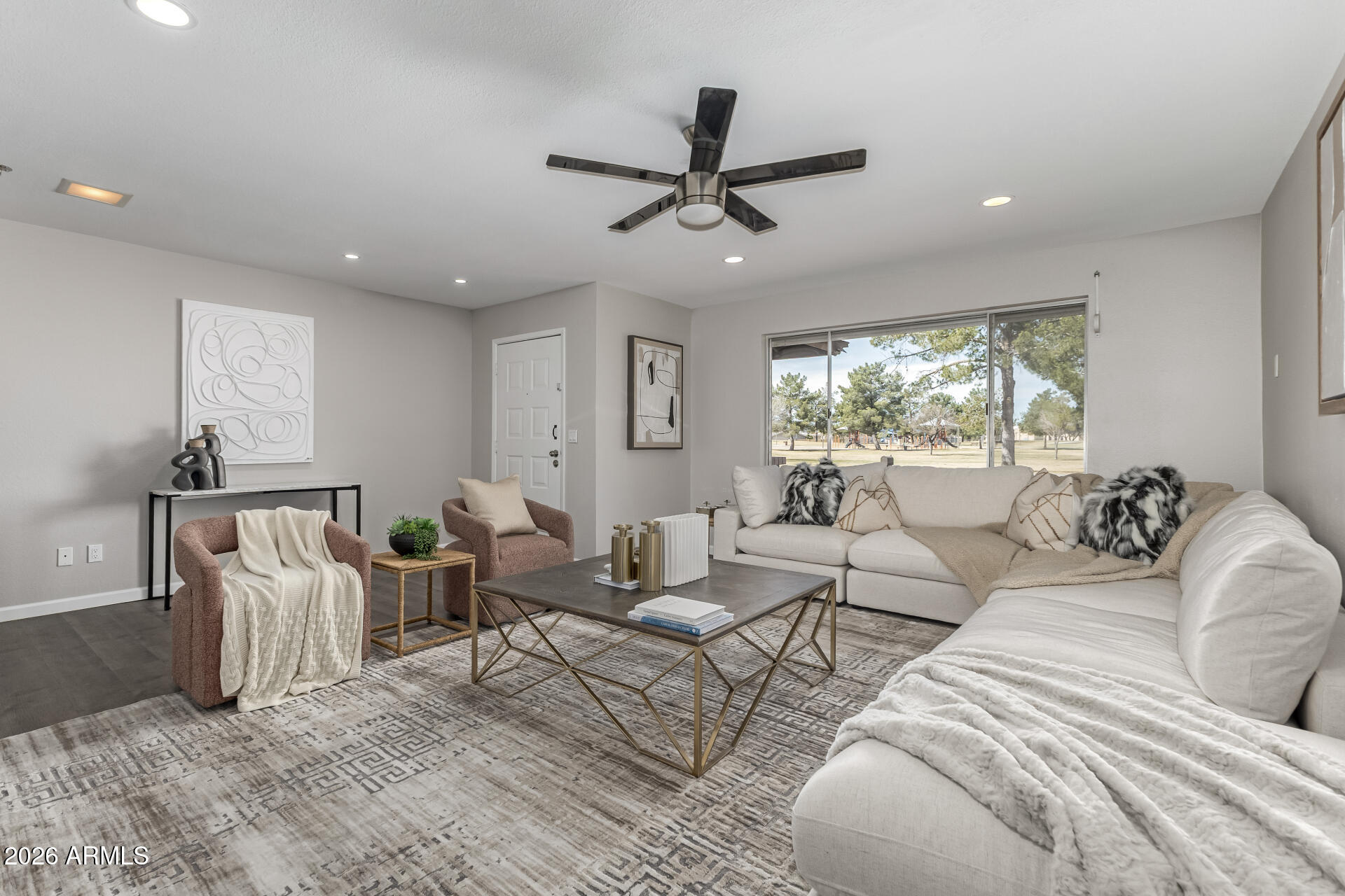 2915 West Hearn Road Phoenix, AZ 85053 - Photo 3 of 28 a living room with furniture and a large window
