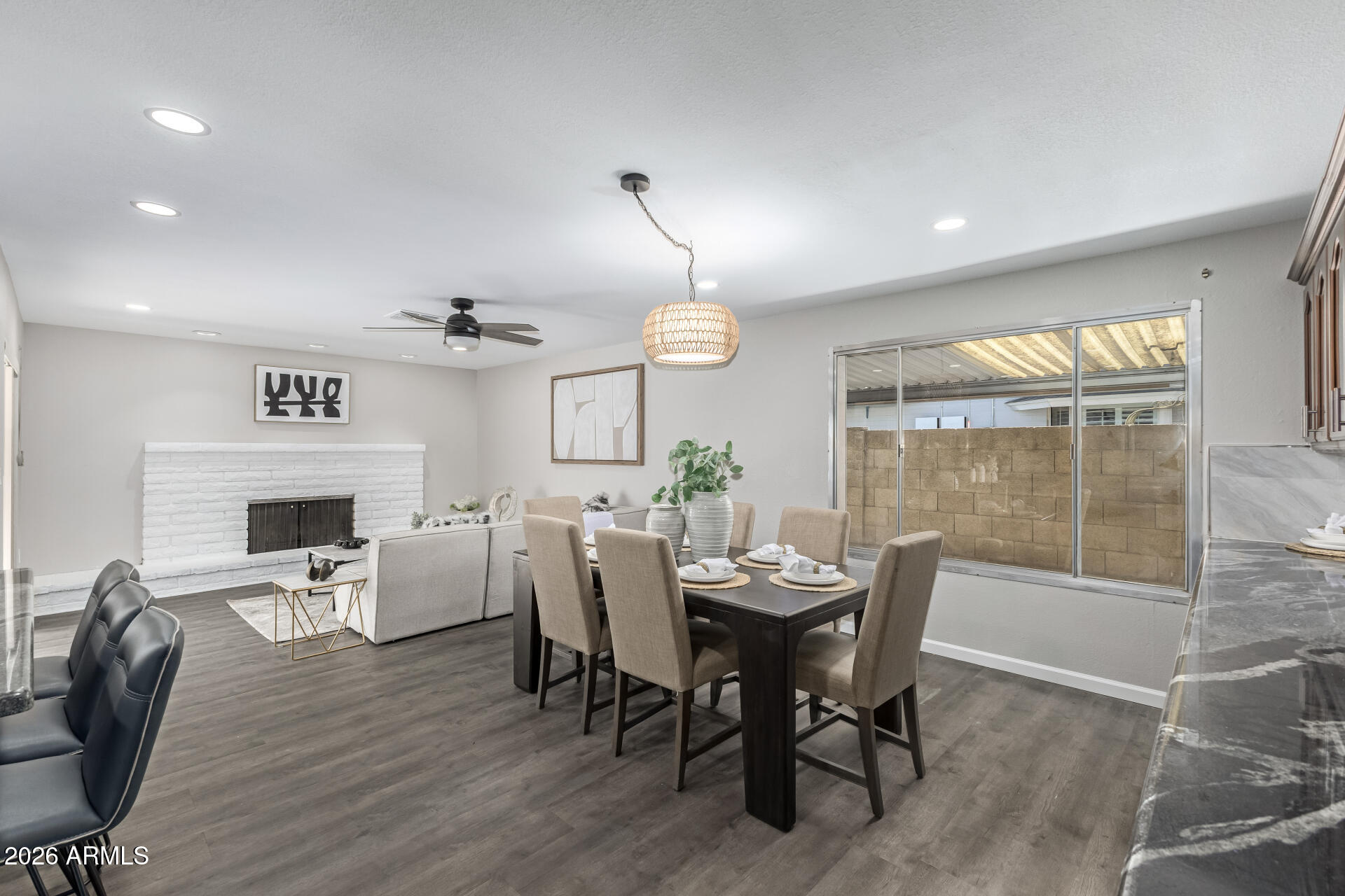 2915 West Hearn Road Phoenix, AZ 85053 - Photo 6 of 28 a view of a dining room with furniture window and wooden floor