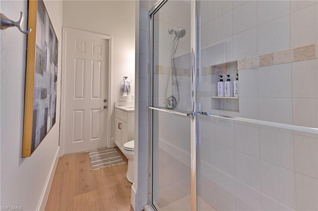 271 Bayview Avenue Naples, FL 34108 - Photo 23 of 35 a bathroom with a tub and shower