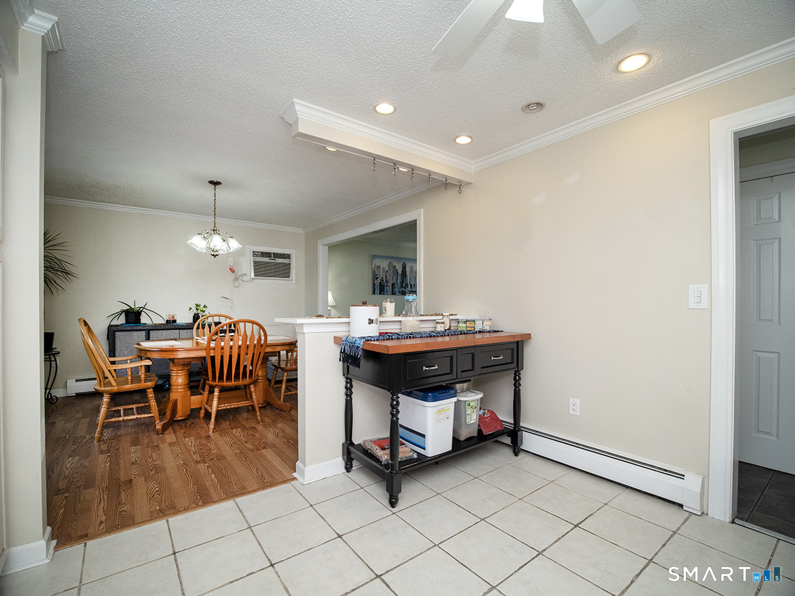 82 Wilcox Road Middletown, CT 06457 - Photo 16 of 27 a room with lots of furniture and a sink
