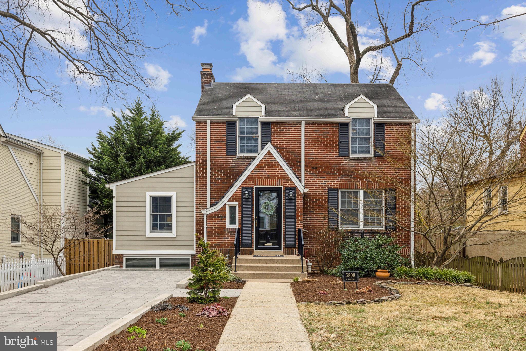 3808 North Pershing Drive Arlington, VA 22203 - Photo 1 of 42 a front view of a house with a yard
