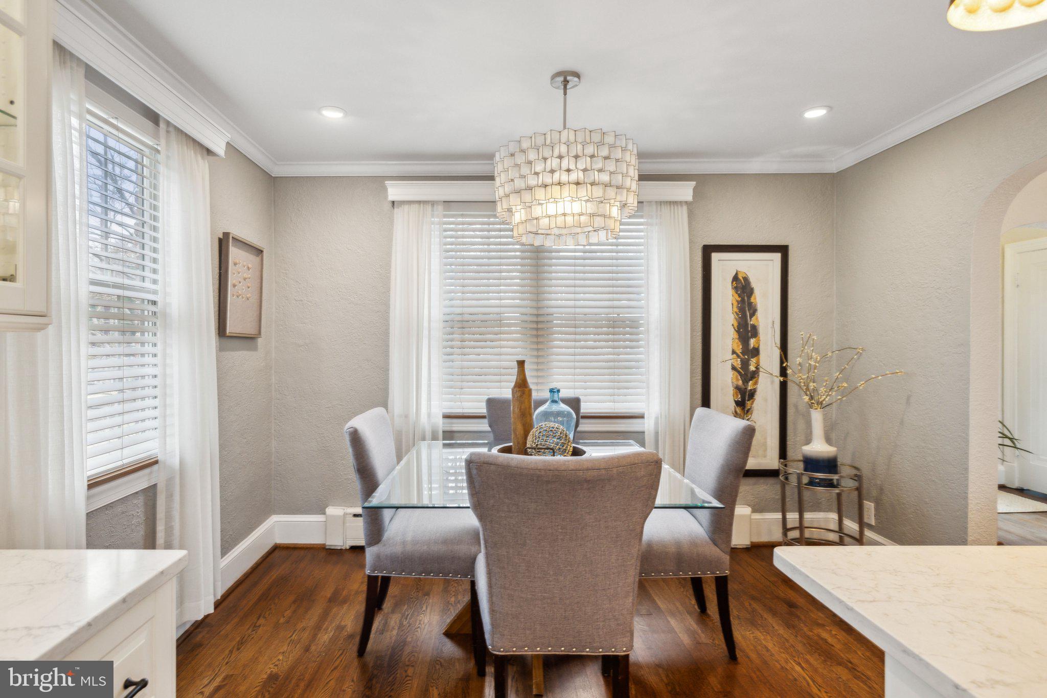 3808 North Pershing Drive Arlington, VA 22203 - Photo 11 of 42 a view of a dining room with furniture window and wooden floor