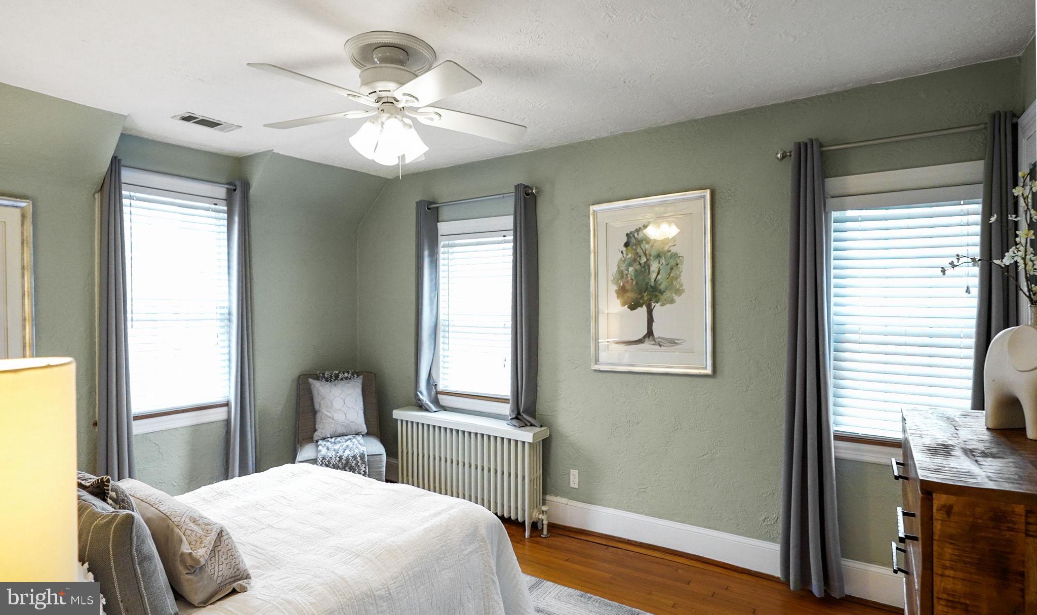 3808 North Pershing Drive Arlington, VA 22203 - Photo 20 of 42 a bedroom with a large bed and a window