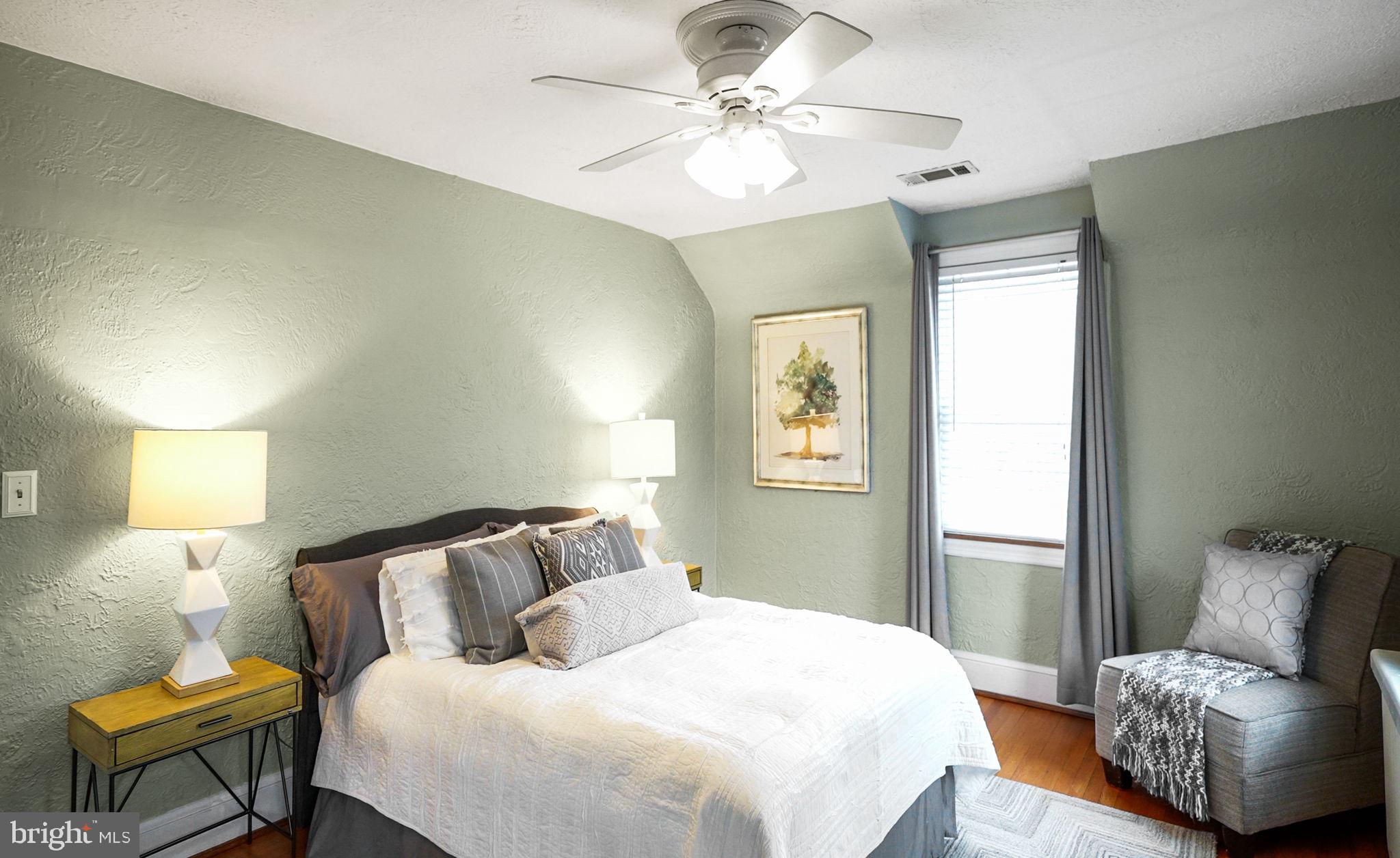 3808 North Pershing Drive Arlington, VA 22203 - Photo 21 of 42 a bedroom with a bed and a couch