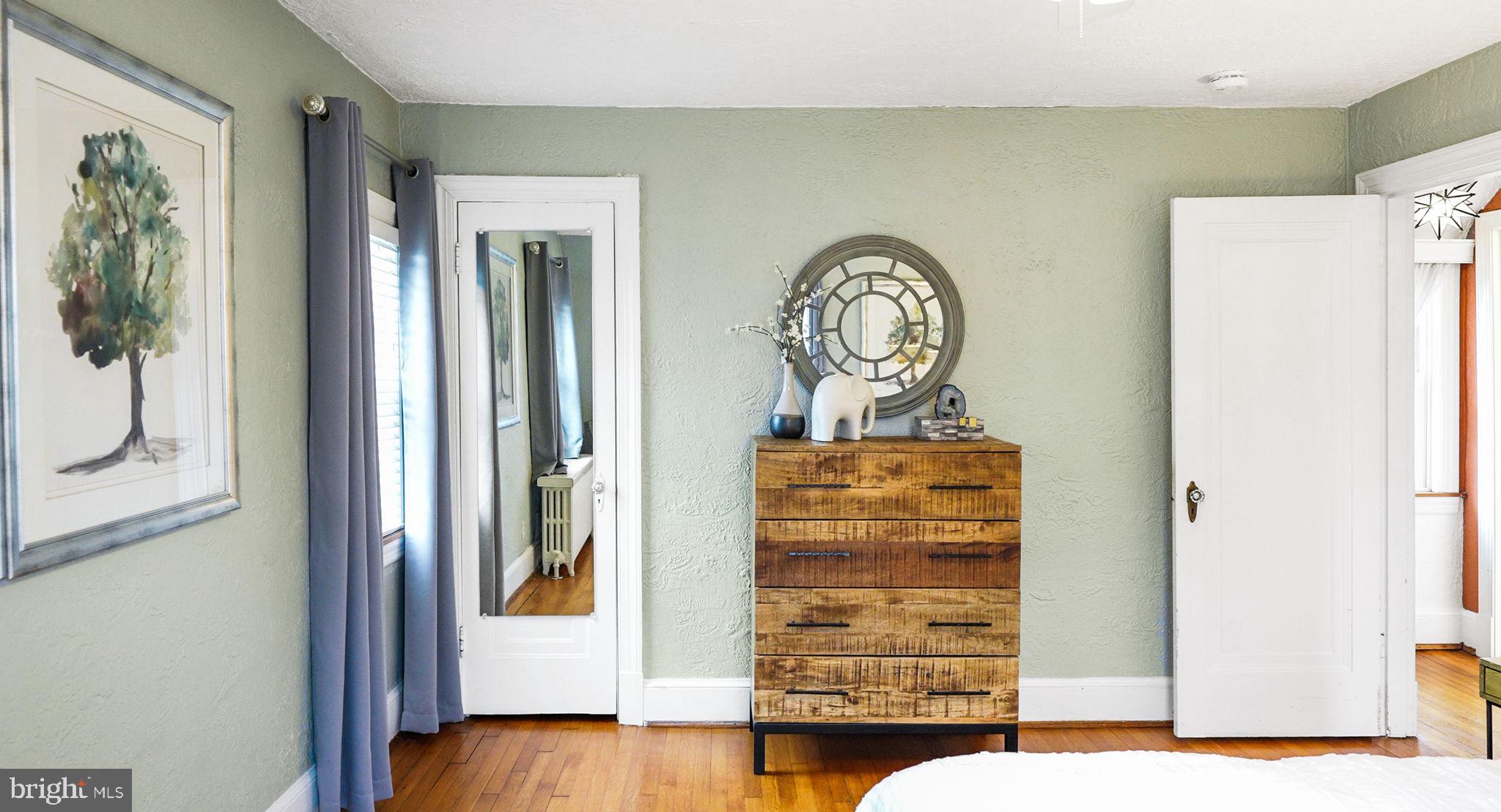 3808 North Pershing Drive Arlington, VA 22203 - Photo 22 of 42 a view of a hallway with entryway wooden floor and front door
