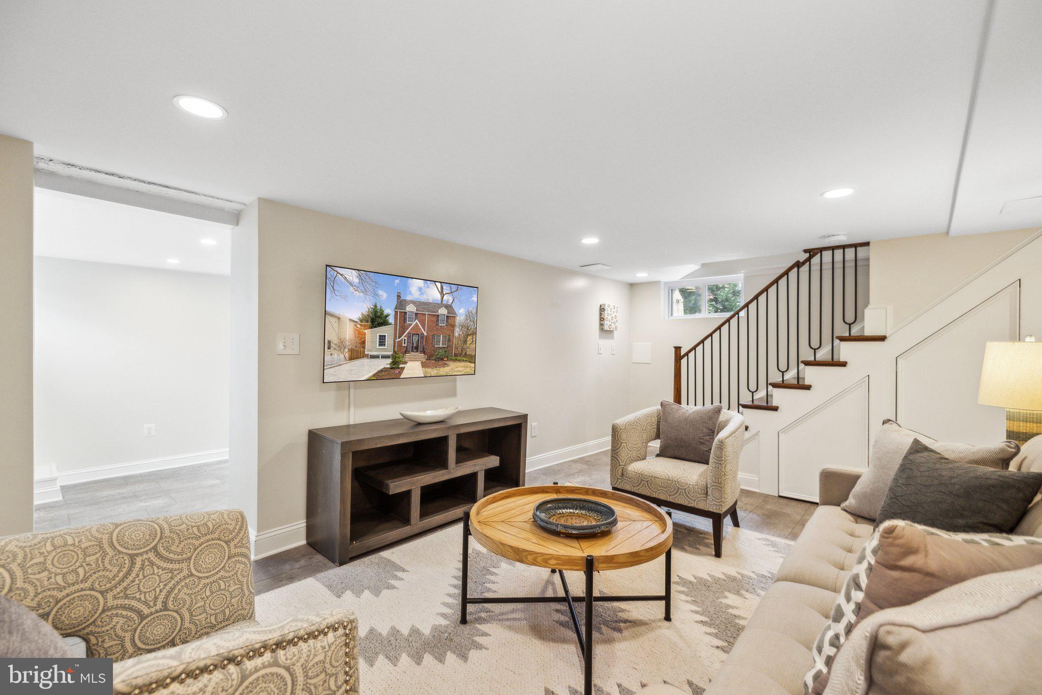 3808 North Pershing Drive Arlington, VA 22203 - Photo 27 of 42 a living room with furniture and a couch