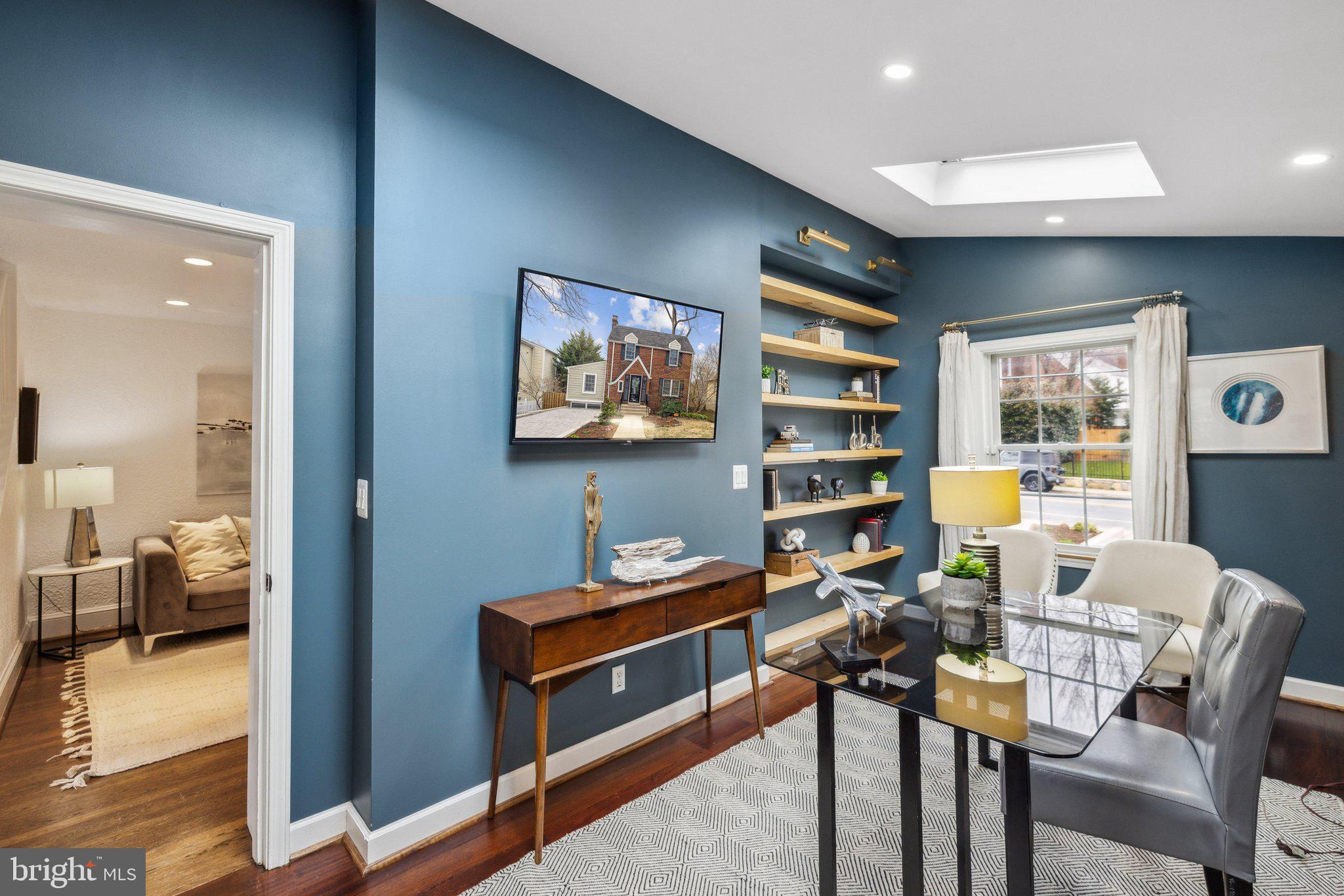 3808 North Pershing Drive Arlington, VA 22203 - Photo 4 of 42 a view of a workspace with furniture and cabinet in a bedroom