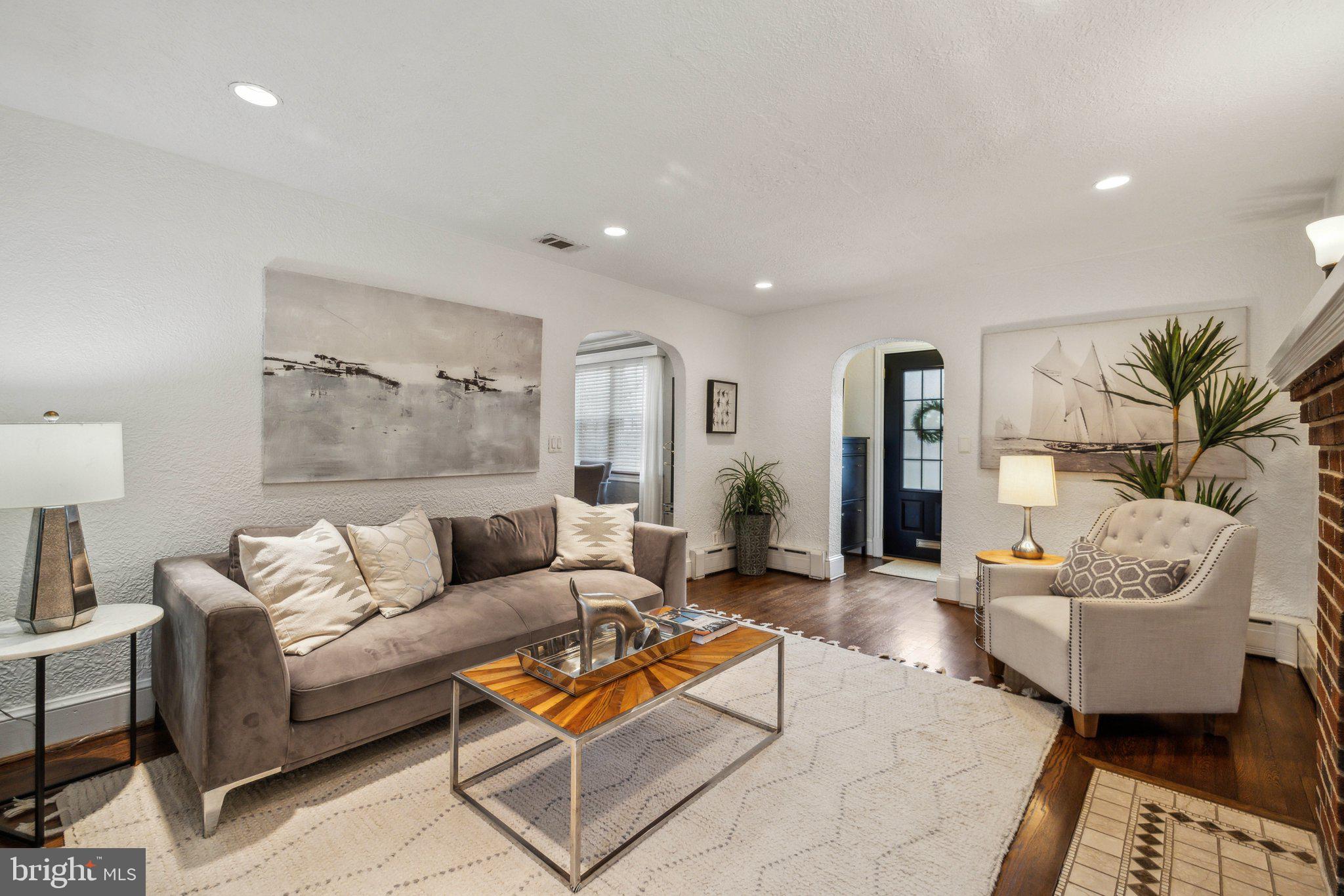 3808 North Pershing Drive Arlington, VA 22203 - Photo 9 of 42 a living room with furniture and a potted plant