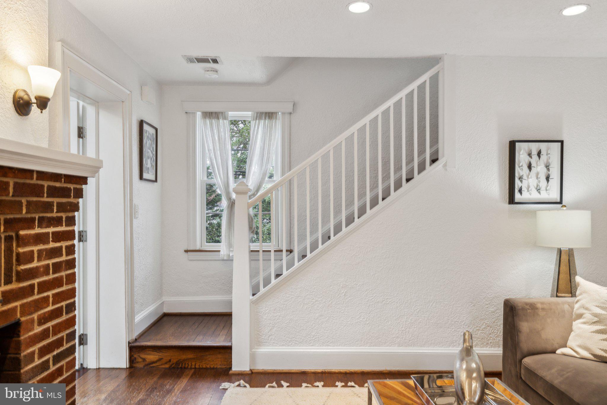 3808 North Pershing Drive Arlington, VA 22203 - Photo 10 of 42 a view of entryway and hall with wooden floor