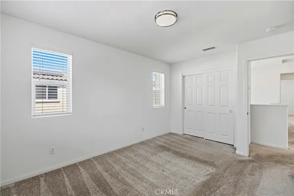 a view of a room with a window