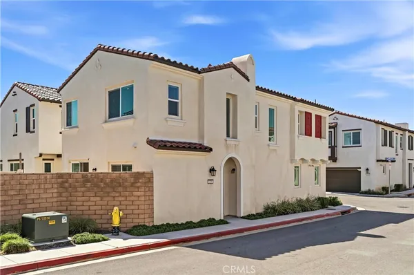 a front view of a house with garage
