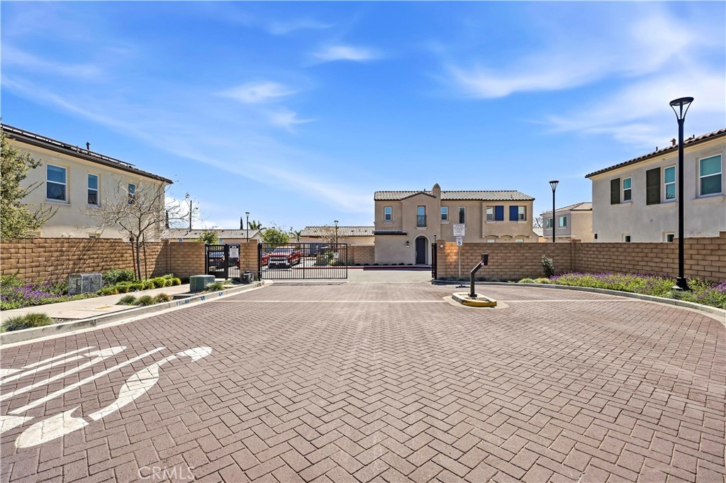 335 Carson Court Rialto, CA 92376 - Photo 26 of 34 a view of a street with cars