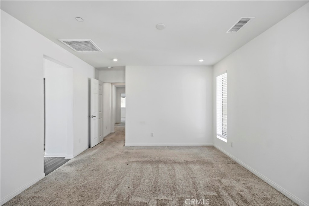 335 Carson Court Rialto, CA 92376 - Photo 9 of 34 a view of an empty room